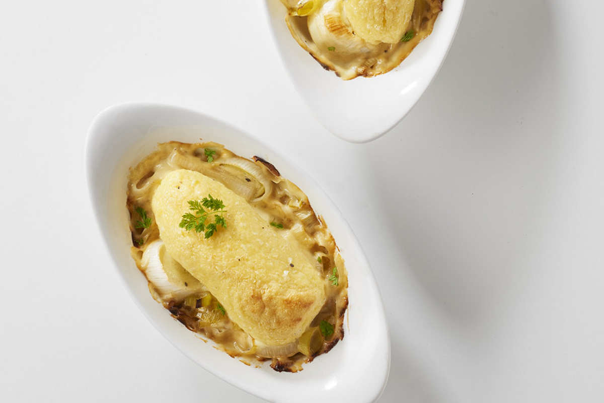 Quenelles de poireaux et éventail de Morteau sauce au miel